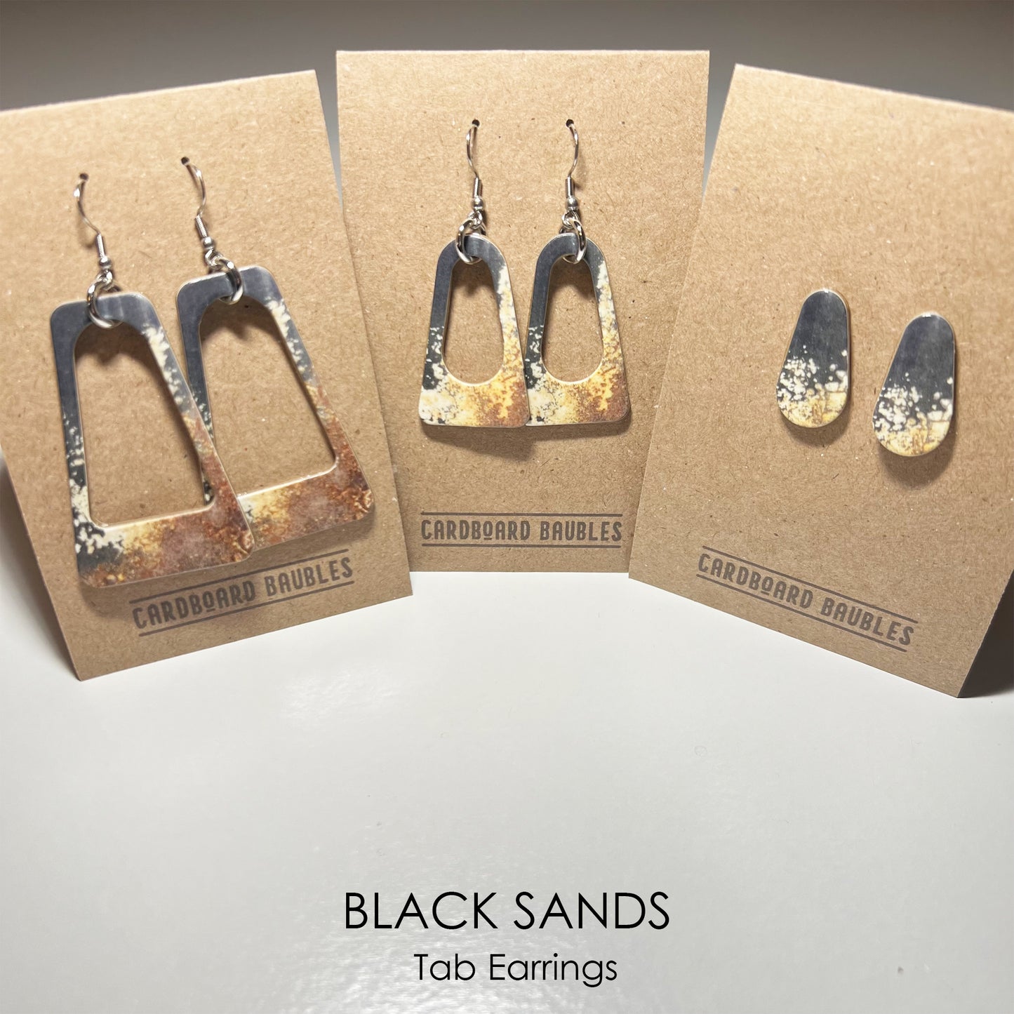 BLACK SANDS - Tab Cardboard Baubles Earrings